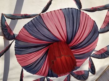 Close-up of multi colored decoration hanging on rope