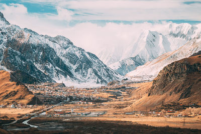 Scenic view of snowcapped mountains against sky