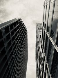 Low angle view of modern buildings against sky