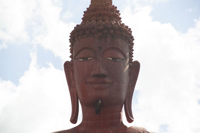 Low angle view of statue against sky