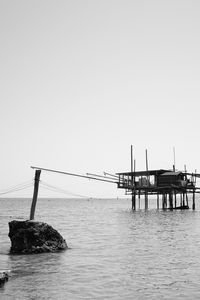 Stilt house in sea