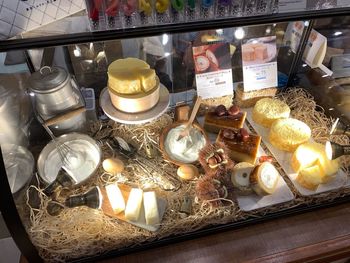 High angle view of illuminated candles in store