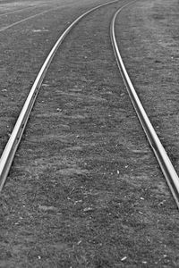 High angle view of railroad tracks black and white 