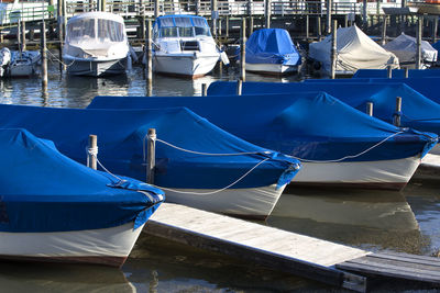 Sailing boats at the pier at the lake chiemsee in bavaria
