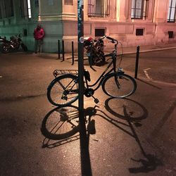 Bicycle parked in front of sidewalk