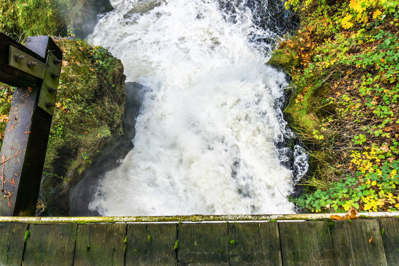 WATER FLOWING THROUGH ROCKS