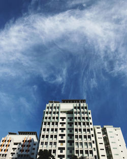 Low angle view of modern building against sky