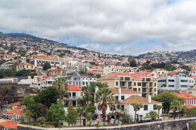 High angle shot of townscape against sky, funchal, madeira
