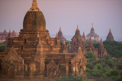 Old ruins of temples against clear sky