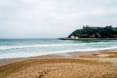 Scenic view of beach against sky
