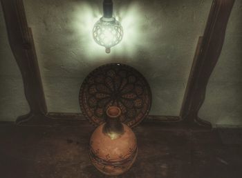 Low angle view of chandelier hanging from ceiling