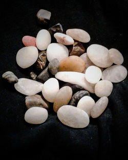 Close-up of eggs against black background