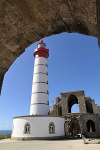 Low angle view of lighthouse against clear sky