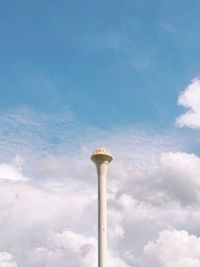 Low angle view of street light against blue sky