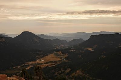 Scenic view of mountains against sky during sunset