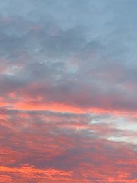 Low angle view of dramatic sky during sunset