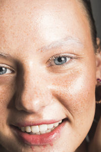 Close-up portrait of smiling mid adult man