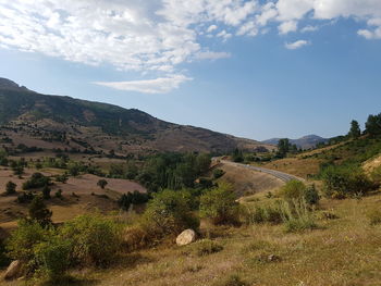 View of countryside landscape against sky