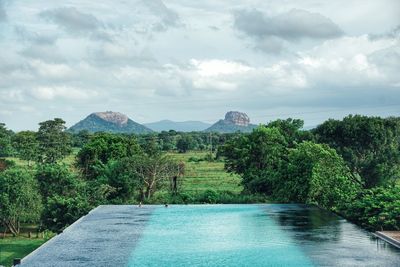 Scenic view of swimming pool against sky