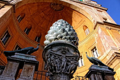 Low angle view of statue against sky