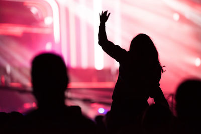 Silhouette people enjoying at music concert