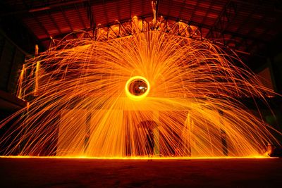 Wire wool spinning indoors at night