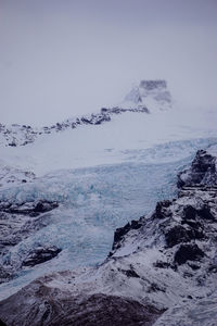 Scenic view of sea against sky during winter