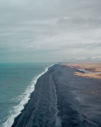 Scenic view of sea and beach against sky