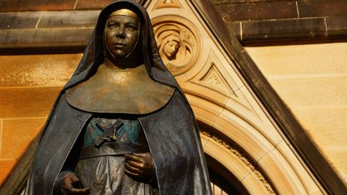 Low angle view of statue of saint