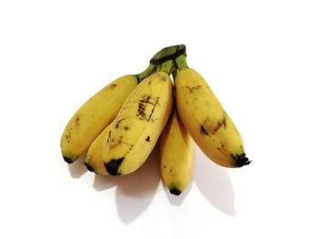 Close-up of lemon against white background