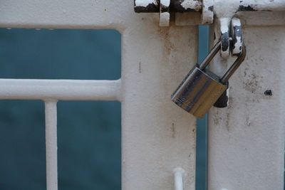 Close-up of padlock on wall