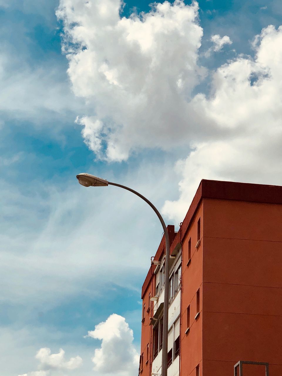 LOW ANGLE VIEW OF STREET LIGHT AGAINST SKY