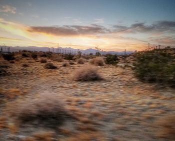 Scenic view of landscape at sunset