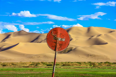 Scenic view of land against sky