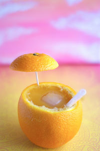 Close-up of orange fruit on table