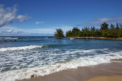 Scenic view of beach against sky