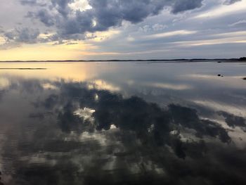 Scenic view of sea at sunset