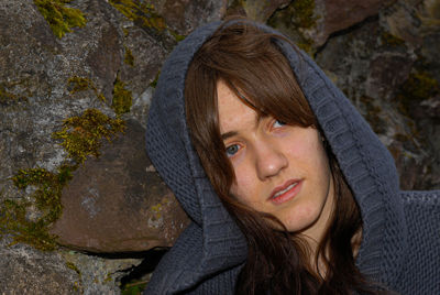 Portrait of a teenage girl on rock