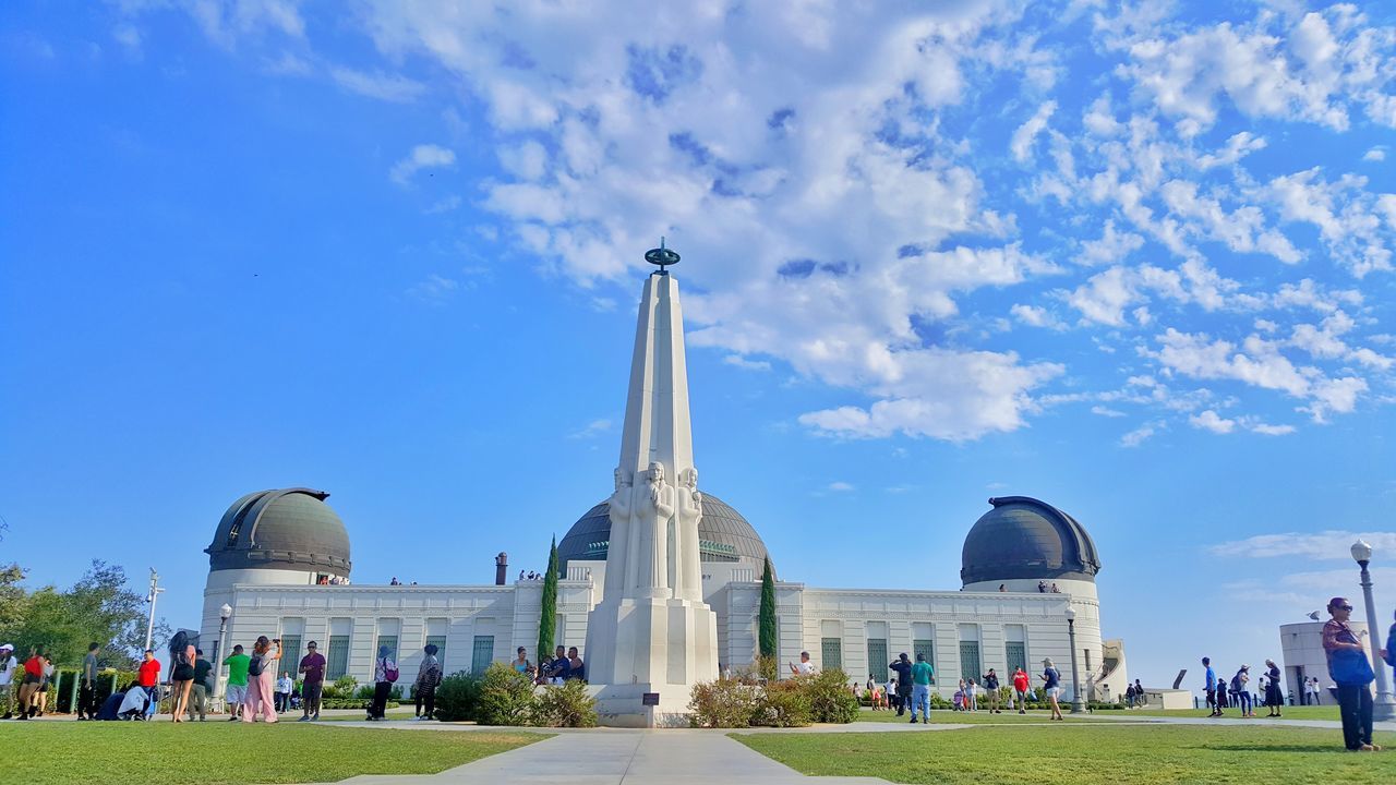 blue, sky, architecture, built structure, cloud - sky, day, history, travel destinations, tourism, building exterior, dome, outdoors, large group of people, architectural column, real people, nature, people