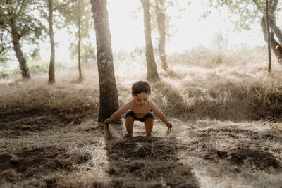 Child playing with soil