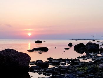 Scenic view of sea against sky during sunset