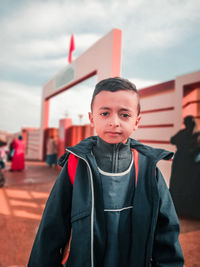 Portrait of boy standing outdoors