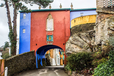 Entrance of building against blue sky