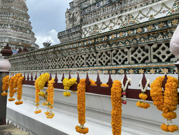 Marigold garland offerings at wat arun temple