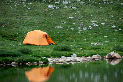 Scenic view of rocks by lake