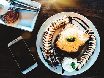 High angle view of breakfast served on table