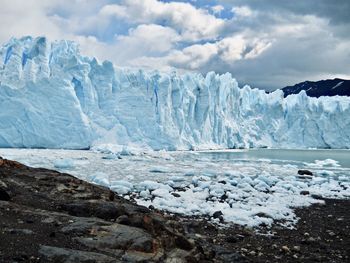 Scenic view of frozen sea against sky