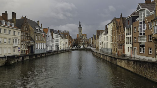 Canal amidst buildings in city