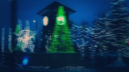 Close-up of illuminated christmas lights at night