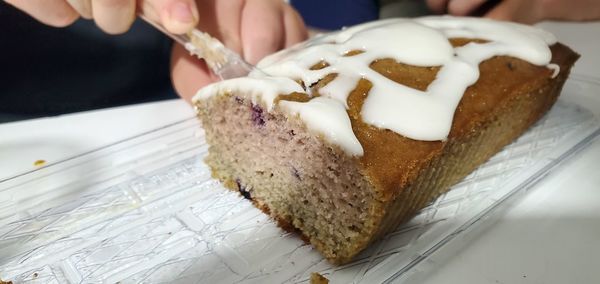 Close-up of hand holding ice cream